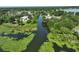 Waterway shot with lush lily pads and deep water access, ready for boating and outdoor adventures at 1422 Avenue H Sw, Winter Haven, FL 33880