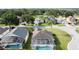A residential area highlighting well-maintained homes, green lawns, and mature trees at 2200 Mallory Cir, Haines City, FL 33844
