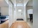 Bright foyer with laminate flooring, a high ceiling, and an open view to other rooms at 2200 Mallory Cir, Haines City, FL 33844