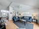 Open-concept living room features lots of natural light and an easy flow to other areas of the home at 2200 Mallory Cir, Haines City, FL 33844
