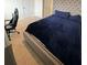 Nicely appointed bedroom featuring a plush blue bed at 2655 Swooping Sparrow Dr, Harmony, FL 34773