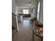 Inviting foyer with tile flooring leading to an open living space at 2655 Swooping Sparrow Dr, Harmony, FL 34773