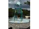 Fun splash pad area with interactive water features, ideal for cooling off on warm days at 2655 Swooping Sparrow Dr, Harmony, FL 34773