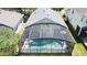Aerial view of the home's screened-in pool and backyard, showcasing the outdoor living space at 2692 Hemingway Ave, Haines City, FL 33844