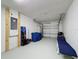 Large garage featuring painted floors with space for car storage and projects at 2692 Hemingway Ave, Haines City, FL 33844