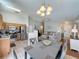 Open floor plan connecting the kitchen, dining area, and living room, ideal for modern living at 2692 Hemingway Ave, Haines City, FL 33844