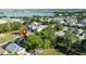 Aerial view of homes overlooking a lake at 2696 Hemingway Ave, Haines City, FL 33844