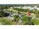Aerial view of homes overlooking golf course in neighborhood at 2696 Hemingway Ave, Haines City, FL 33844