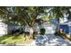 Charming single-story home with a well-manicured lawn and attached garage at 2696 Hemingway Ave, Haines City, FL 33844