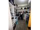Walk-in closet with built-in shelving and hanging rods offering functional storage at 400 W 4Th Ct, Frostproof, FL 33843