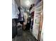 Walk-in closet with shelving and hanging space offers ample storage for clothes and accessories at 400 W 4Th Ct, Frostproof, FL 33843