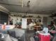 A spacious garage provides storage space, and includes an automatic door, shelving, and refrigerator at 400 W 4Th Ct, Frostproof, FL 33843