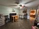 An open-concept room with quirky decor and an adjoining kitchen, a unique design element at 400 W 4Th Ct, Frostproof, FL 33843