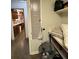 Walk-in pantry featuring dark-stained wood cabinets and tile floors at 400 W 4Th Ct, Frostproof, FL 33843
