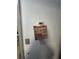 Wall-mounted thermostat next to decor at 400 W 4Th Ct, Frostproof, FL 33843