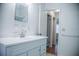 Bright bathroom featuring a white vanity and a view into an adjacent room at 4725 Kayworth Rd, Lake Wales, FL 33898