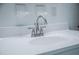 Close-up of the vanity with a silver faucet and clean white countertop at 4725 Kayworth Rd, Lake Wales, FL 33898
