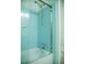 Retro bathroom with blue tiled shower at 4725 Kayworth Rd, Lake Wales, FL 33898