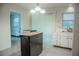 Bright kitchen with white cabinets, appliances and an island at 4725 Kayworth Rd, Lake Wales, FL 33898