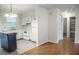 Functional kitchen with white cabinetry, appliances, and an adjacent dining area at 4725 Kayworth Rd, Lake Wales, FL 33898