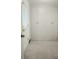 Utility room featuring storage closets, a window and a door at 4725 Kayworth Rd, Lake Wales, FL 33898