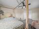 Bedroom featuring carpet flooring, a ceiling fan, and view of the closet at 509 Mountain Dr, Babson Park, FL 33827