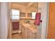 Cozy bathroom features a white countertop and retro tile flooring at 509 N Scenic Hwy, Frostproof, FL 33843