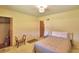 Minimalist bedroom design with carpet floors, light walls, and a simple yet elegant aesthetic at 509 N Scenic Hwy, Frostproof, FL 33843