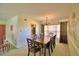 Elegant dining room with a large table and chandelier, perfect for Gathering gatherings at 509 N Scenic Hwy, Frostproof, FL 33843