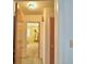 Hallway offers natural light leading to the home's inviting bedroom at 509 N Scenic Hwy, Frostproof, FL 33843