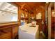 Practical laundry room with a washer and dryer and ample shelving at 509 N Scenic Hwy, Frostproof, FL 33843