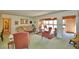 Open living space leading to sunroom, featuring classic furnishings and lots of natural light at 509 N Scenic Hwy, Frostproof, FL 33843