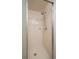 This tiled walk-in shower has a showerhead and clean design at 6201 Country Club Dr # 21, Lake Wales, FL 33898