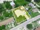 Aerial view of the property with its defined boundaries, showcasing the home and its surrounding lot at 715 S Seminole Ave, Fort Meade, FL 33841