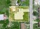 Aerial view of the property with its defined boundaries, showcasing the home and its surrounding lot at 715 S Seminole Ave, Fort Meade, FL 33841