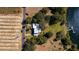 Aerial view of home with lake frontage, mature trees, and ample space for outdoor activities at 7254 Wisteria Ln, Lake Wales, FL 33898