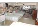 Spacious bedroom featuring multiple beds, built-in bookshelves, and a cozy atmosphere at 7254 Wisteria Ln, Lake Wales, FL 33898