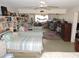 Bright bedroom featuring multiple beds, built-in bookshelves, and a welcoming atmosphere at 7254 Wisteria Ln, Lake Wales, FL 33898
