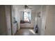 Spacious closet with built-in drawers, storage benches, and multiple closet doors for ample storage at 7254 Wisteria Ln, Lake Wales, FL 33898