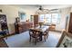 Traditional dining room features a wooden table, chairs and built in storage at 7254 Wisteria Ln, Lake Wales, FL 33898