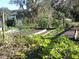Well-maintained garden with raised beds, perfect for growing vegetables at 7254 Wisteria Ln, Lake Wales, FL 33898