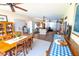 Open living and dining space with lots of natural light and vintage decor at 7254 Wisteria Ln, Lake Wales, FL 33898