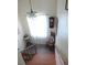 Stairwell with a star pendant and decor with a window for natural light at 7254 Wisteria Ln, Lake Wales, FL 33898