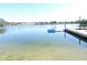 Beautiful waterfront view with a private dock and clear water for swimming and recreation at 7254 Wisteria Ln, Lake Wales, FL 33898