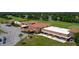 Beautiful clubhouse overlooking the lush golf course, ideal for social gatherings and events at 7591 Limonia Dr, Indian Lake Estates, FL 33855