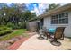 Enjoy outdoor dining on the spacious patio, located in the backyard next to the home at 882 Redwood Way, Lake Wales, FL 33898