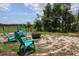 Outdoor brick patio with comfortable seating around a fire pit, perfect for relaxation and gatherings at 882 Redwood Way, Lake Wales, FL 33898