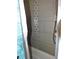 Shower features a long shower head and nice tile at 882 Redwood Way, Lake Wales, FL 33898