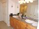 Bathroom vanity with double sinks and tile flooring at 9365 Lemon Dr, Lake Wales, FL 33898