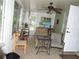 Cozy sunroom with multiple windows, neutral color palette, and comfortable seating at 9365 Lemon Dr, Lake Wales, FL 33898